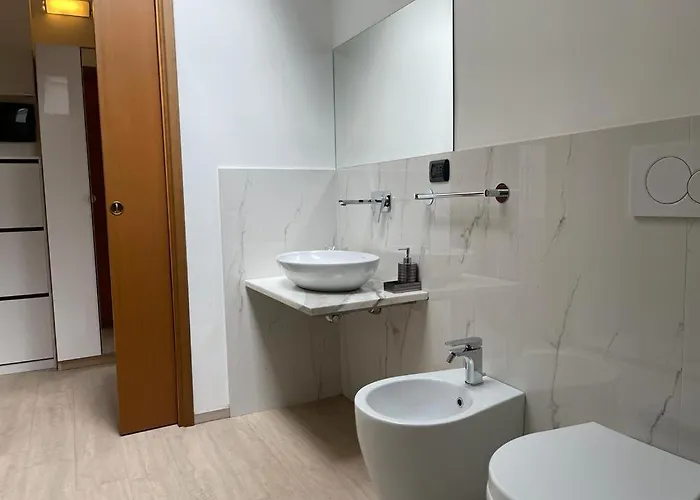 Kibilu - Bilocale Con Piscina Parcheggio Vicinanze Maggiore 아파트